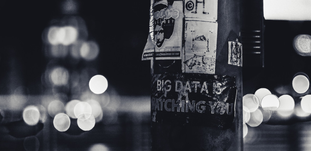 Poster on pole proclaiming 'big data is watching you'